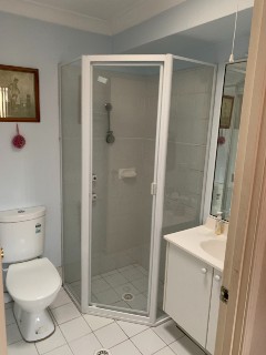 diamond-fully-framed-pivot-door-white-shower-screen
